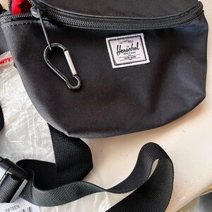 Herschel Supply Company Black Crossbody Bag with Red Accents